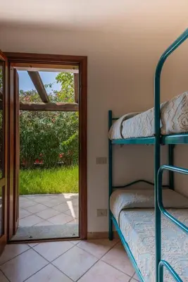 Letto o letti in una camera di Simple Gem of Le Dimore di Budoni no1947