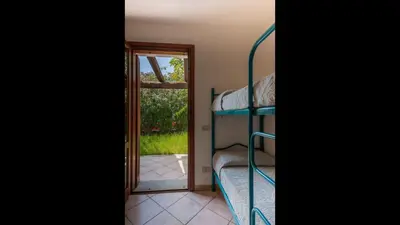 Letto o letti in una camera di Simple Gem of Le Dimore di Budoni 2 Bedroom sleeps 6