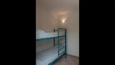 Letto o letti in una camera di Simple Gem of Le Dimore di Budoni no1949