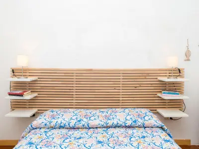 Letto o letti in una camera di Apartment Arcobaleno by Interhome