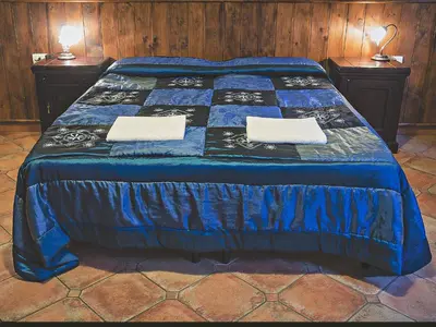 Letto o letti in una camera di Bed and Breakfast Ichnos