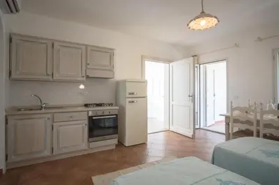 Cucina o angolo cottura di Superb Le Residenze del Golfo di Orosei num2191