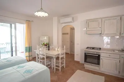 Cucina o angolo cottura di Superb Le Residenze del Golfo di Orosei no2193