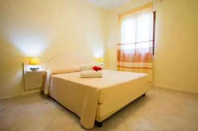 Letto o letti in una camera di Relaxing Le Residenze del Maria Rosaria num2215