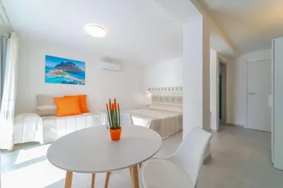 Letto o letti in una camera di La Stampa Home
