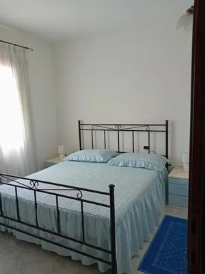 Letto o letti in una camera di Bandi
