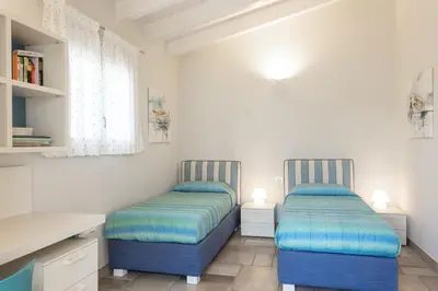 Letto o letti in una camera di Villa the Queen