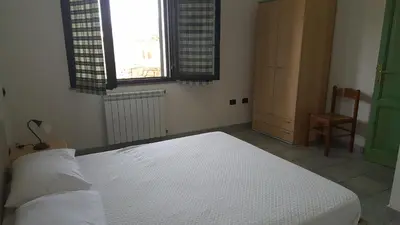 Letto o letti in una camera di CASA WILMA