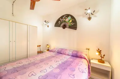 Letto o letti in una camera di ISS Travel, Villa Fiorita - 800 m from La Cinta beach