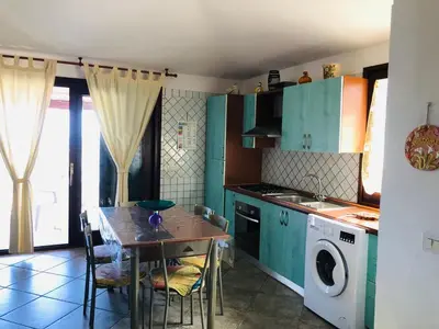 Cucina o angolo cottura di Villetta Arborea Vista Mare