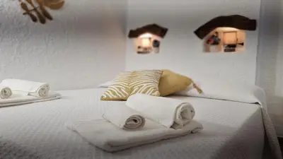 Letto o letti in una camera di Villa Sa Mama
