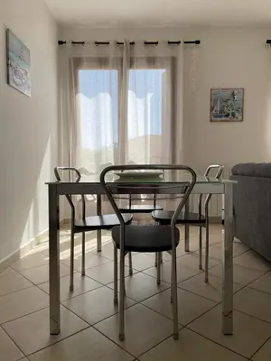 Area soggiorno di Wanna's Apartment Olbia