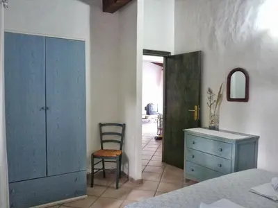 Letto o letti in una camera di Le Caterine