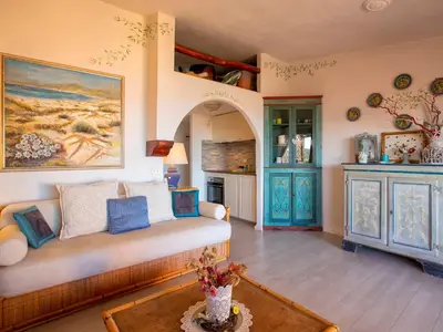 Area soggiorno di Apartment E-1-4 - Marineledda by Interhome