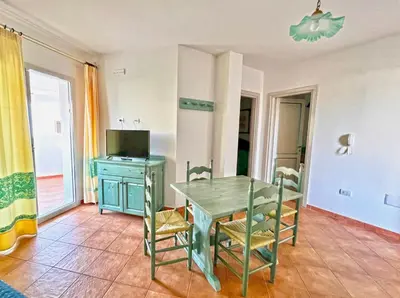 Cucina o angolo cottura di ISA-Residence in Orosei apartments with air conditioning and private outdoor area