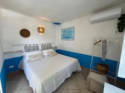 Letto o letti in una camera di Teodora e Teodorina bohemien house