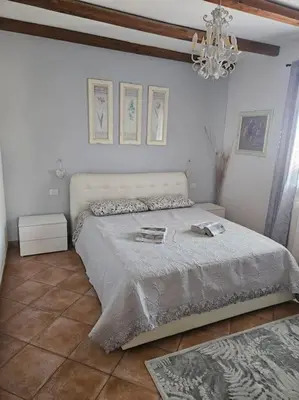 Letto o letti in una camera di Attico Anais