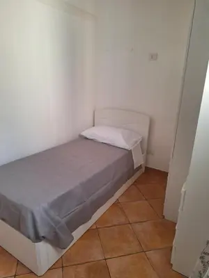 Letto o letti in una camera di Attico Anais