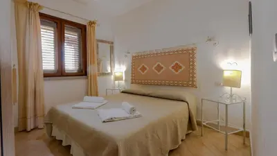 Letto o letti in una camera di Casa Monte Ruiu