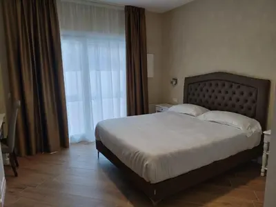 Letto o letti in una camera di RMaison Luxury Suites Olbia