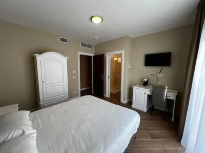 Letto o letti in una camera di RMaison Luxury Suites Olbia
