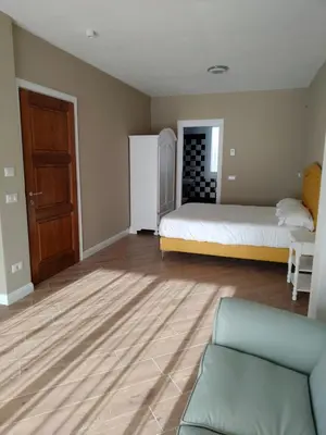 Letto o letti in una camera di RMaison Luxury Suites Olbia