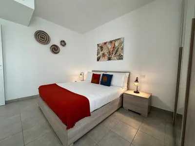 Letto o letti in una camera di NG Collection 4.4