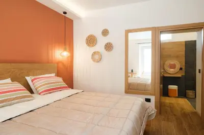 Letto o letti in una camera di In centro da Carlotta