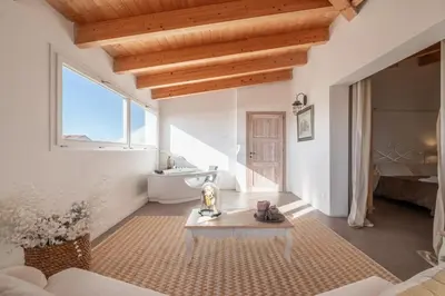 Area soggiorno di Dimoras Boutique Rooms