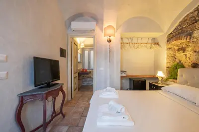 TV o dispositivi per l'intrattenimento presso Dimoras Stone Suites