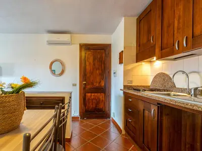 Cucina o angolo cottura di Apartment CSC - 5 - Baia de Bahas by Interhome