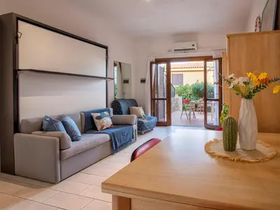 Area soggiorno di Apartment D3 - 2 - Baia de Bahas by Interhome