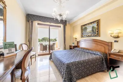 Letto o letti in una camera di Hotiday Olbia Porto