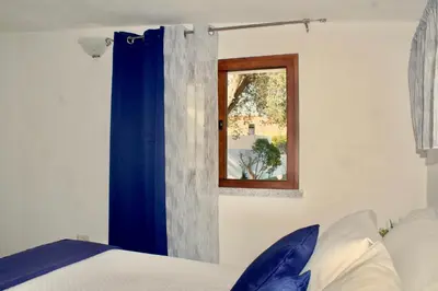Letto o letti in una camera di Casa Moderna