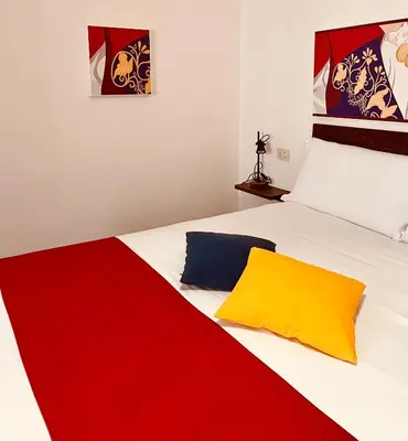Letto o letti in una camera di Carrales Guest House