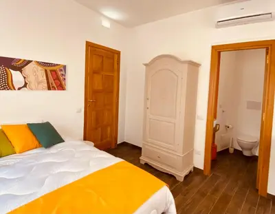 Letto o letti in una camera di Carrales Guest House