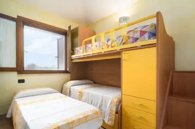 Letto o letti in una camera di Villa Luna