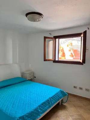 Letto o letti in una camera di Casa Vacanze Padru