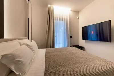 TV o dispositivi per l'intrattenimento presso Superior 1BR vacation Suite - Fully Equipped - Azulis2 - Garden - FREE Parking