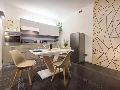 Cucina o angolo cottura di La Gardenia Deluxe Apartment