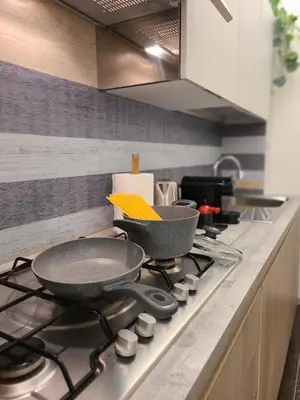 Cucina o angolo cottura di La Gardenia Deluxe Apartment