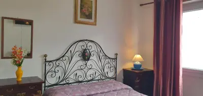 Letto o letti in una camera di IL CENTRALE GUEST HOUSE NEW