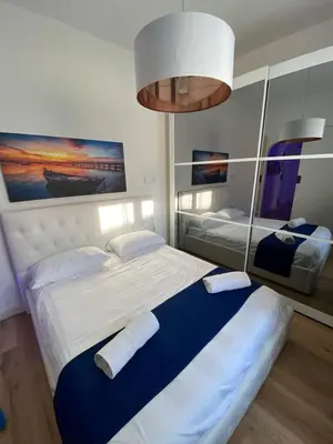 Letto o letti in una camera di Island Suites Waterfront IUN R5783