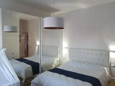 Letto o letti in una camera di Island Suites Waterfront IUN R5783