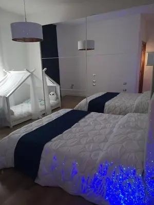 Letto o letti in una camera di Island Suites Waterfront IUN R5783