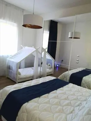Letto o letti in una camera di Island Suites Waterfront IUN R5783