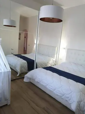 Letto o letti in una camera di Island Suites Waterfront IUN R5783