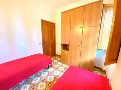 Letto o letti in una camera di Villino Ambra 1
