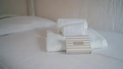 Letto o letti in una camera di Acqua e Tramonto