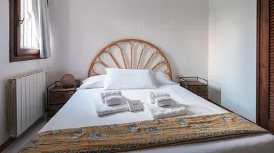 Letto o letti in una camera di Acqua e Tramonto